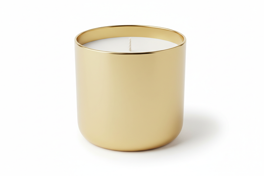gold candle tumbler filled with white wax and a white candle wick for an 11oz candle